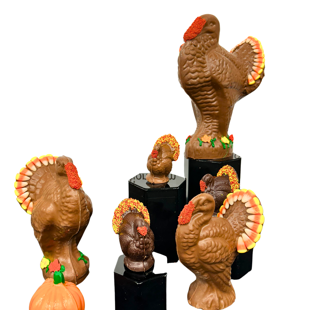 Handcrafted 3D chocolate turkey figurine in milk chocolate, detailed feathers and festive shape.”