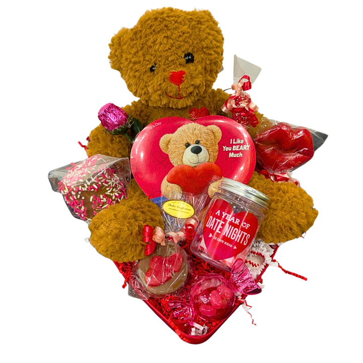 Valentine’s Day assorted chocolate gift box with plush bear and candy

