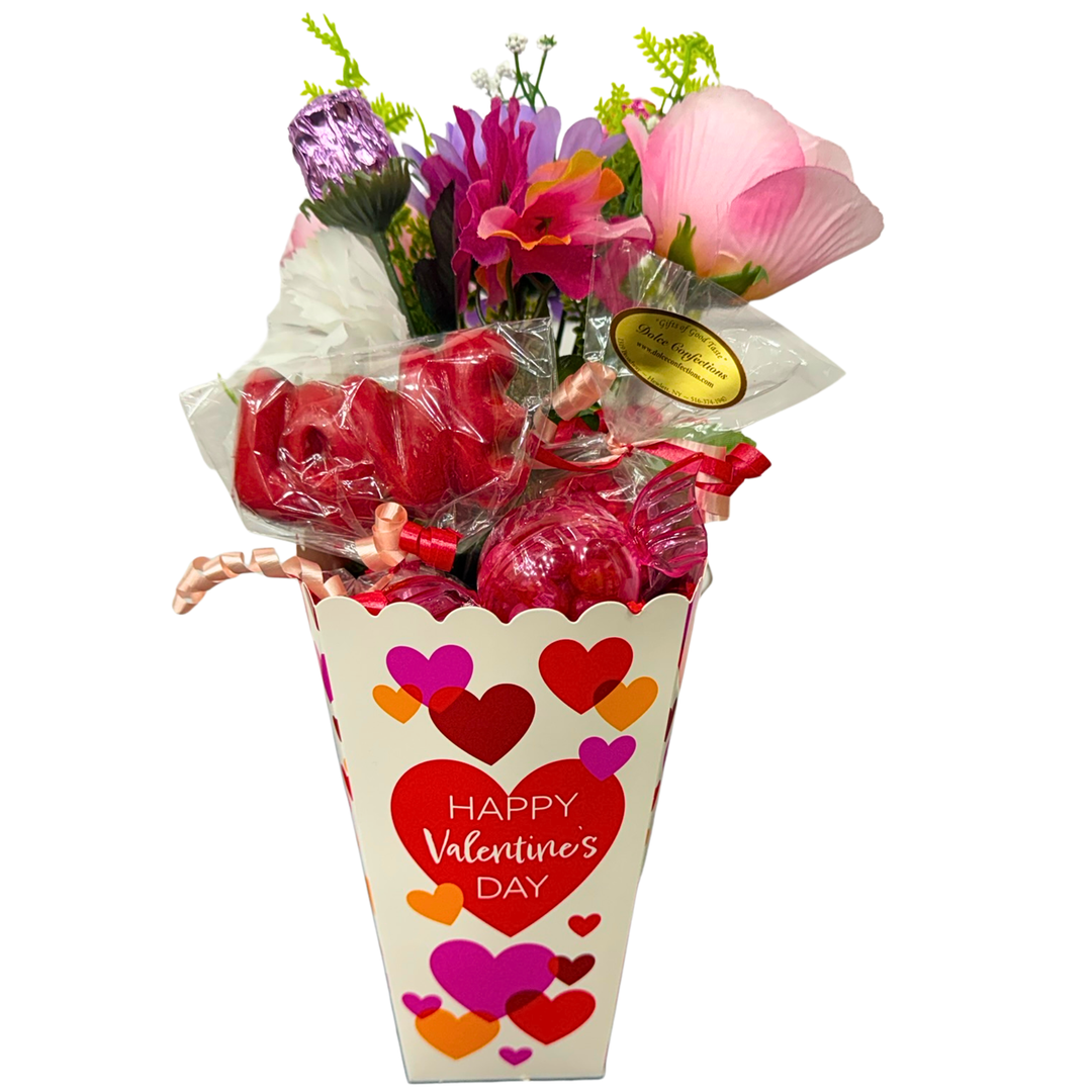 Assorted Valentine’s chocolate gift box with plush toy and decorative packaging
