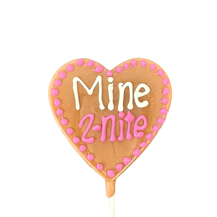 Close up of Valentine chocolate message pops with piped lettering