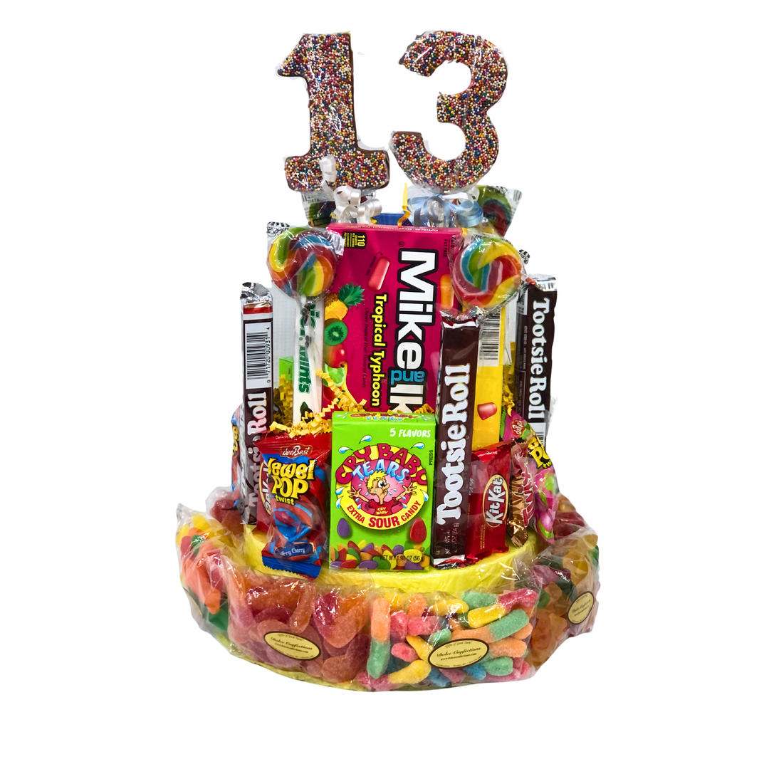 Small candy cake layered with colorful gummies and sour candies