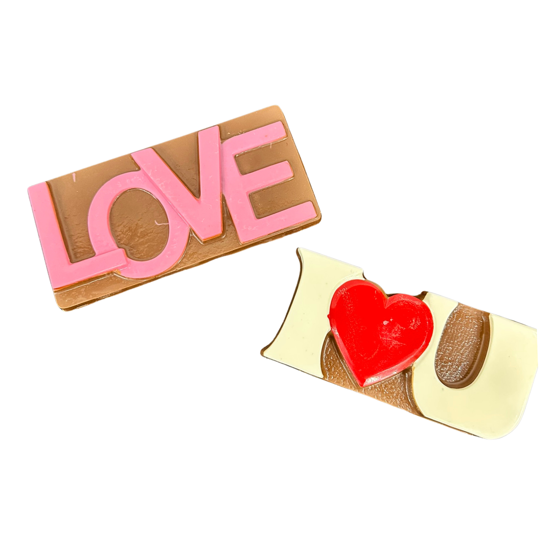 Handcrafted “Love You” chocolate bars by Dolce Confections
csharp
Copy code
