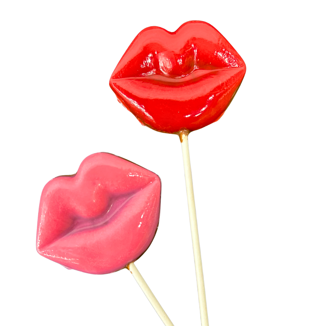 Assorted Valentine’s chocolate pops with heart, lips, and love designs made from milk chocolate
