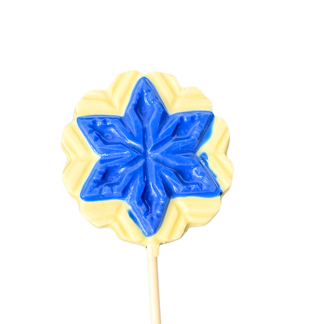 White chocolate Hanukkah pop with blue snowflake in the center
