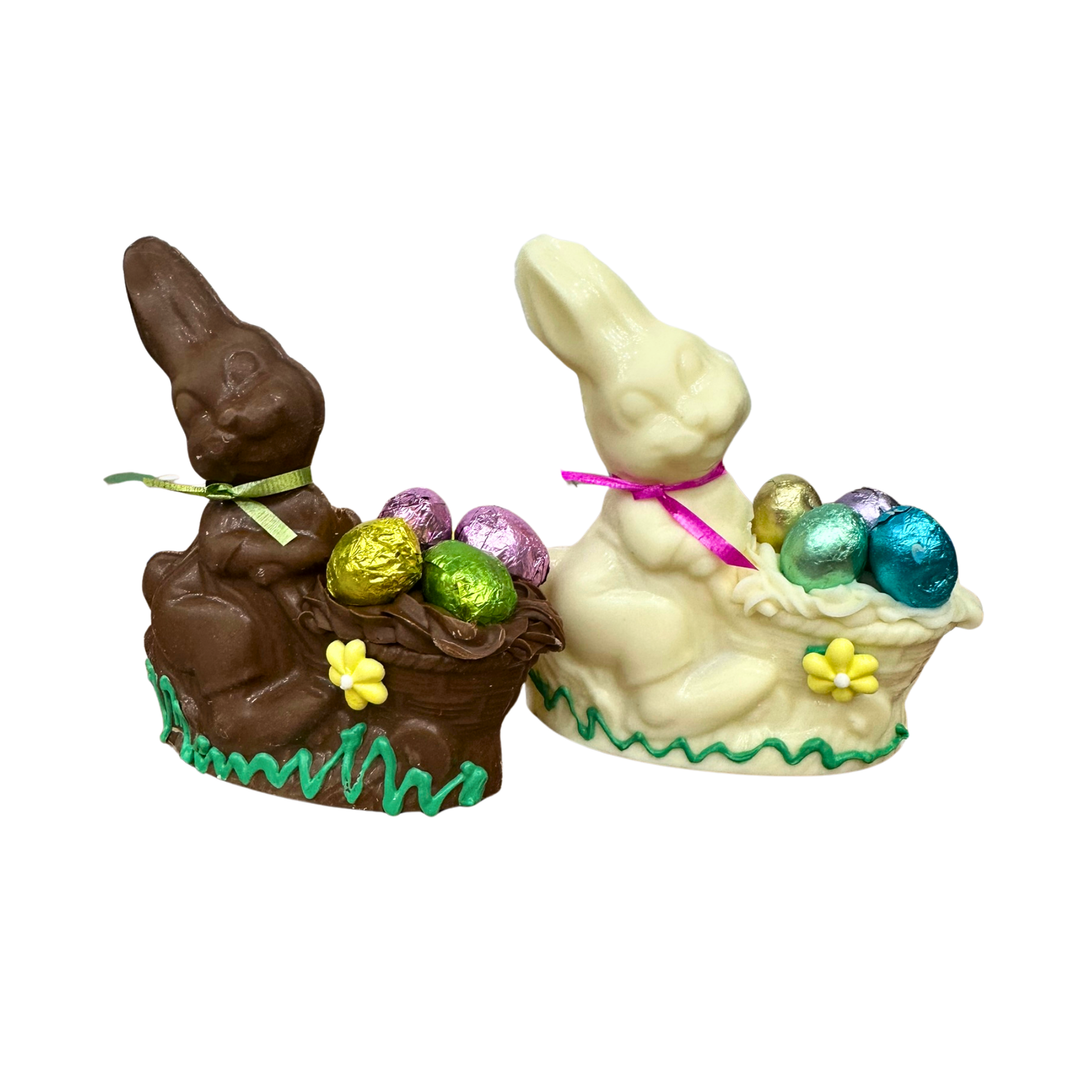 Milk chocolate and white chocolate bunny wheelbarrow Easter figures with chocolate eggs
