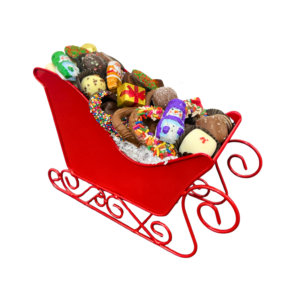 Holiday sled candy gift basket with gourmet chocolate truffles milk dark white