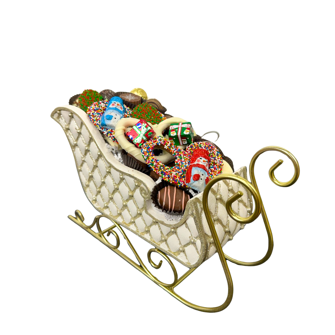 Deluxe stone Christmas sled filled with assorted Belgian chocolates Dolce Confections